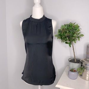 A new day silky black high-neck blouse with zipper in back. Size S